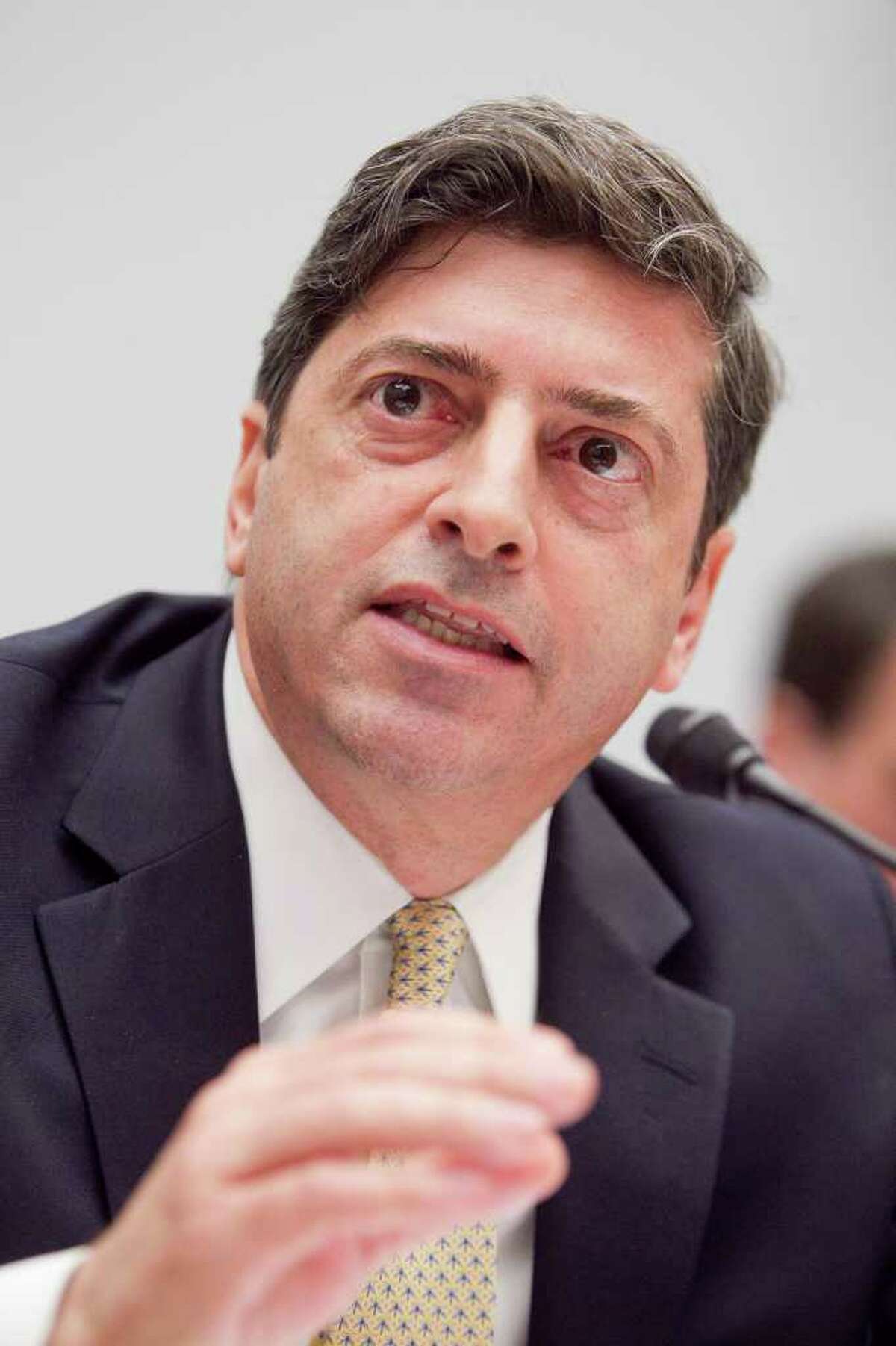Robert Khuzami, director of the division of enforcement at the U.S. Securities Exchange Commission (SEC), speaks during a House Financial Services Committee hearing on the Stanford ponzi scheme in Washington, D.C., U.S., on Friday, May 13, 2011. The SEC, criticized for missing indicted financier R. Allen Stanford's alleged $7 billion fraud, said it will decide in the near future whether victims should collect federal brokerage insurance. Photographer: Andrew Harrer/Bloomberg *** Local Caption *** Robert Khuzami