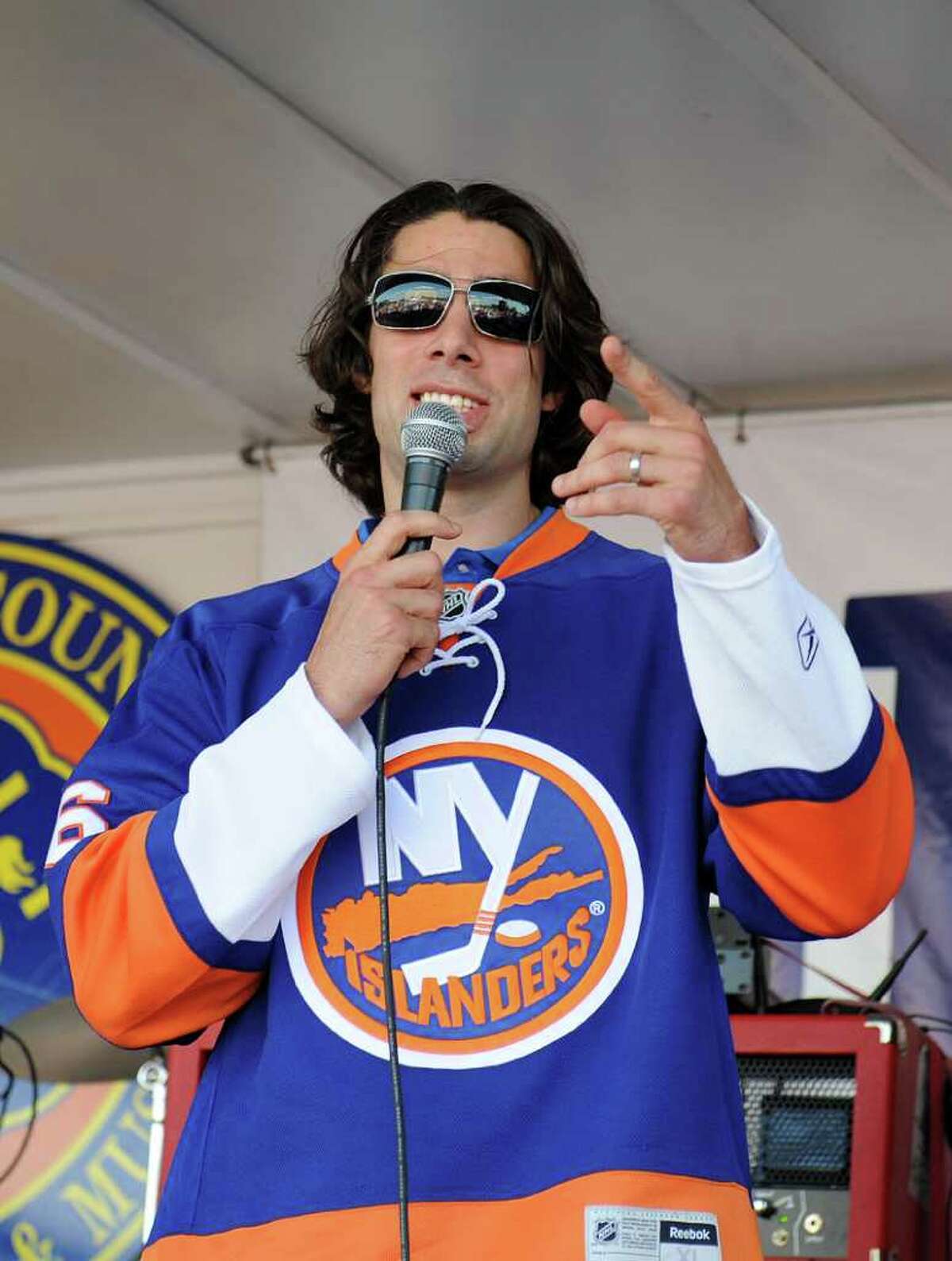 UNIONDALE, NY - JULY 27: Matt Moulson #36 of the New York Islanders speaks during the fan rally at Nassau Coliseum on July 27, 2011 in Uniondale, New York. (Photo by Christopher Pasatieri/Getty Images)