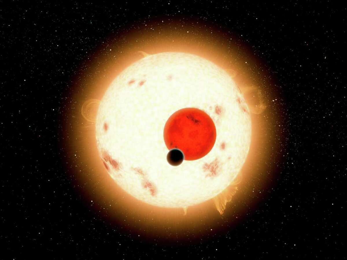 NASA / JPL - CALTECH 'STAR WARS' FIND?: The planet Kepler-16b, shown in this rendering, is the first to be found orbiting two suns, much like the planet Tatooine of the Star Wars films.