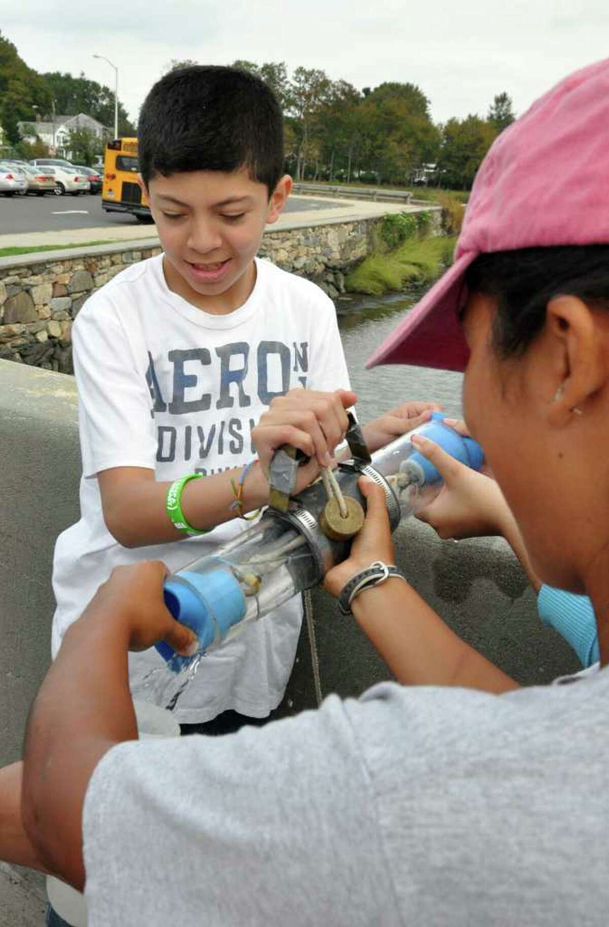 Scofield, Chinese students get feet wet in water testing project