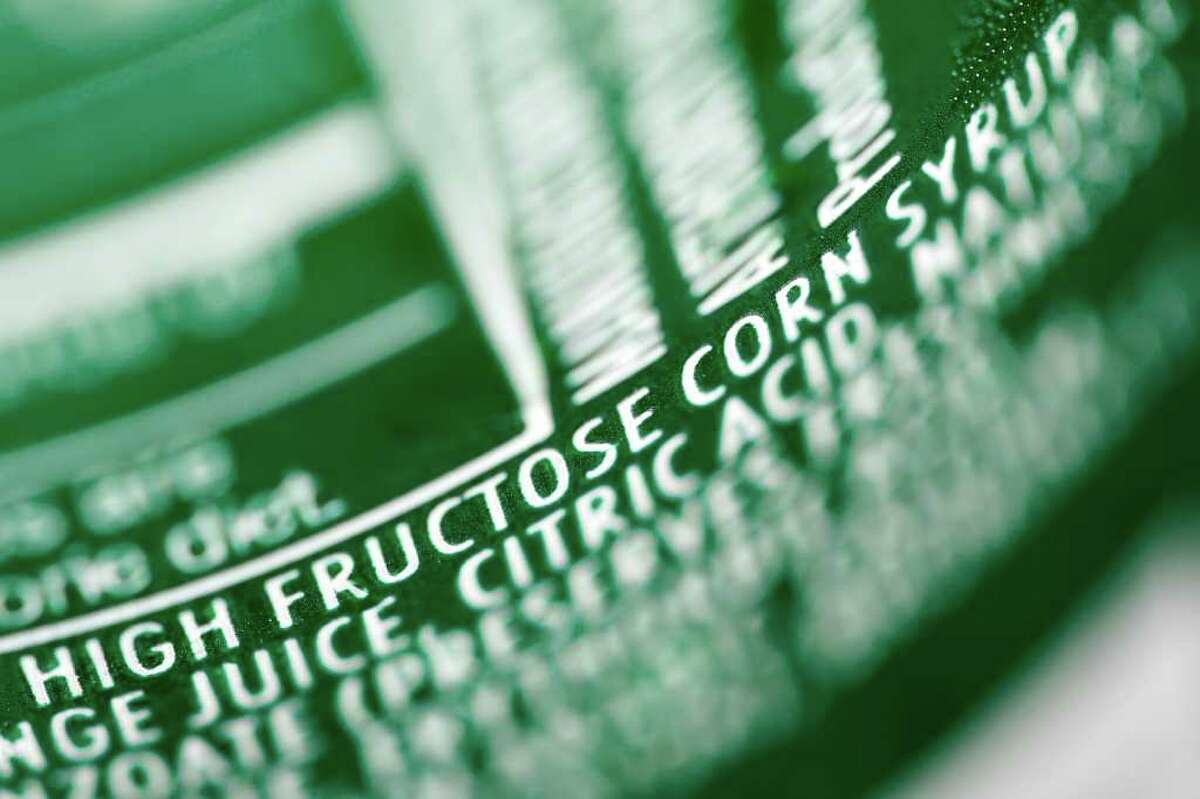 MATT ROURKE : ASSOCIATED PRESS WHAT'S IN A NAME: A nutrition label on a can of soda shows the ingredient high fructose corn syrup. The Corn Refiners Association wants to use "corn sugar" as an alternative name for the syrup after some scientists linked the product to obesity.