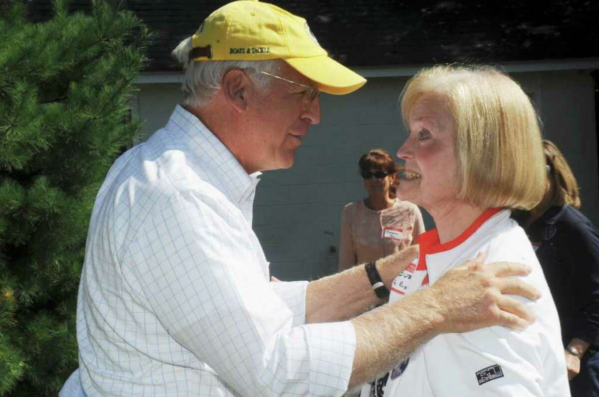 Former U.S. Rep. Christopher Shays, who is considering a run for the U.S. Senate speaks with Suzanne Robbins, of Greenwich, at the Cos Cob Republican Club and Republican Town Committee's 80th annual clambake Sunday, Sept. 18, 2011.