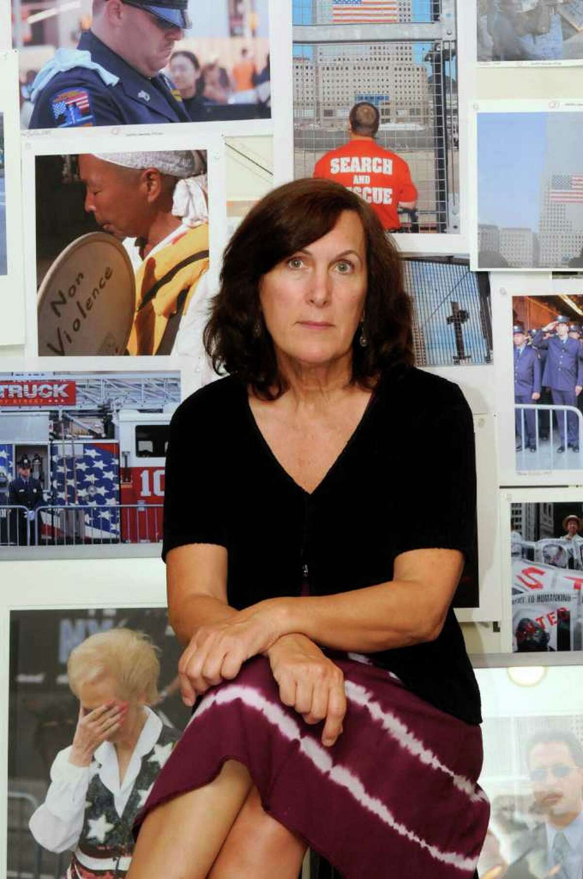 Local photographer Marie Triller, who has visited the 9/11 memorial at ground zero every anniversary and has just published a photography book, "Ten Years: Remembering 9/11" at her home in Albany, NY Thursday Sept.8, 2011. ( Michael P. Farrell/Times Union)