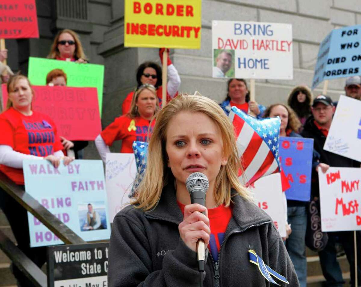Tiffany Hartley speaks at a rally at the Capitol in Denver on Wednesday, March 30, 2011, where she demanded that the U.S. government do more to find the body of her husband, David Hartley, who was presumably gunned down on a lake along Texas' border with Mexico.