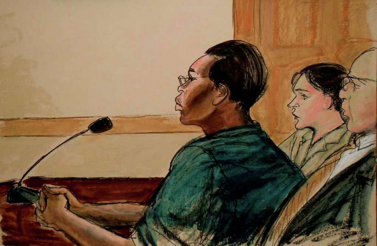 In this courtroom sketch, Ann Pettway, left, the woman accused of kidnapping infant Carlina White from a New York hospital more than two decades ago, is shown seated in court with her attorneys Sabrina Schroff, center, and Robert Baum, right, on Monday, Jan. 24, 2011, in New York. Pettway surrendered Sunday, days after a widely publicized reunion between the child she raised, now an adult, and the biological mother. (AP Photo/Elizabeth Williams)