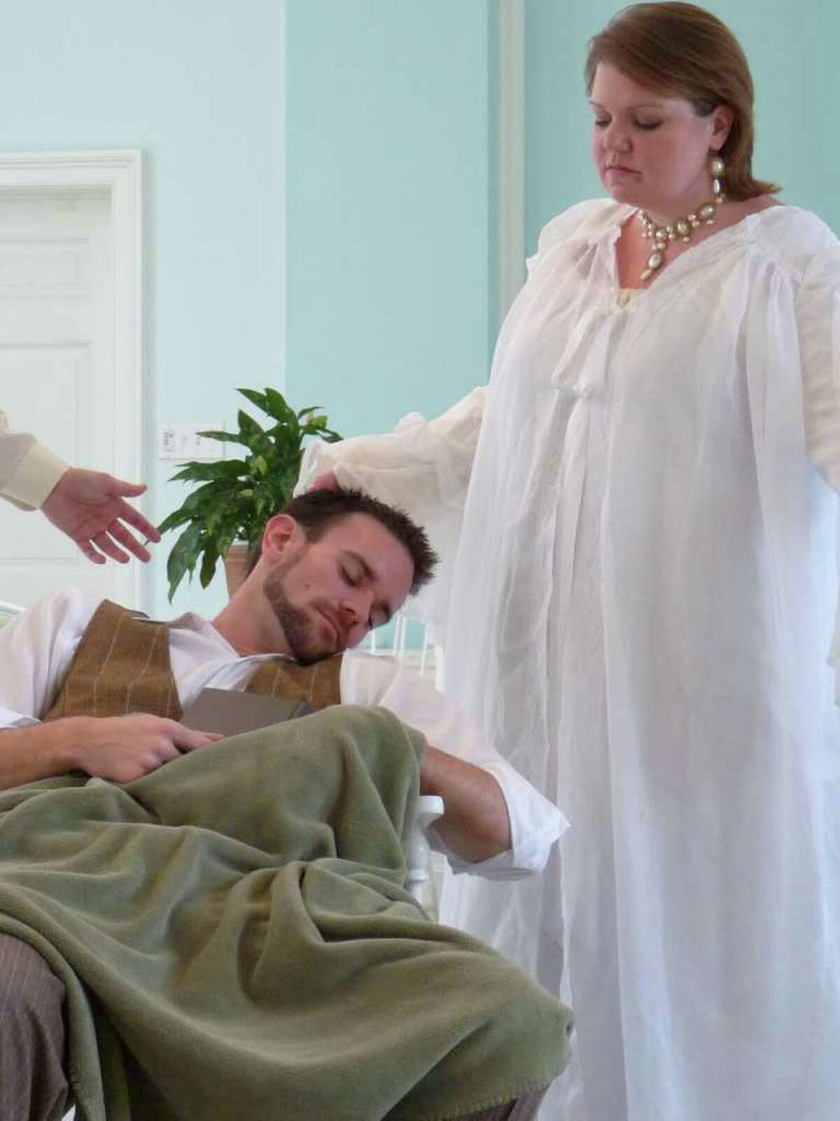 Michael Vaughn and Ann Scott Davis portray William and Madeline in Opera Vista's production of "The Fall of the House of Usher," a Philip Glass opera based on the short story by Edgar Allan Poe. Opera Vista is presenting the piece Sept. 24 at Bayou Bend.