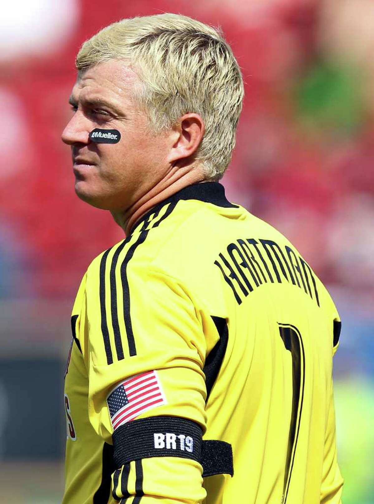 FRISCO, TX - SEPTEMBER 24: Kevin Hartman of FC Dallas wears an arm band in memory of Bobby Rhine during play against the Houston Dynamo at Pizza Hut Park on September 24, 2011 in Frisco, Texas.
