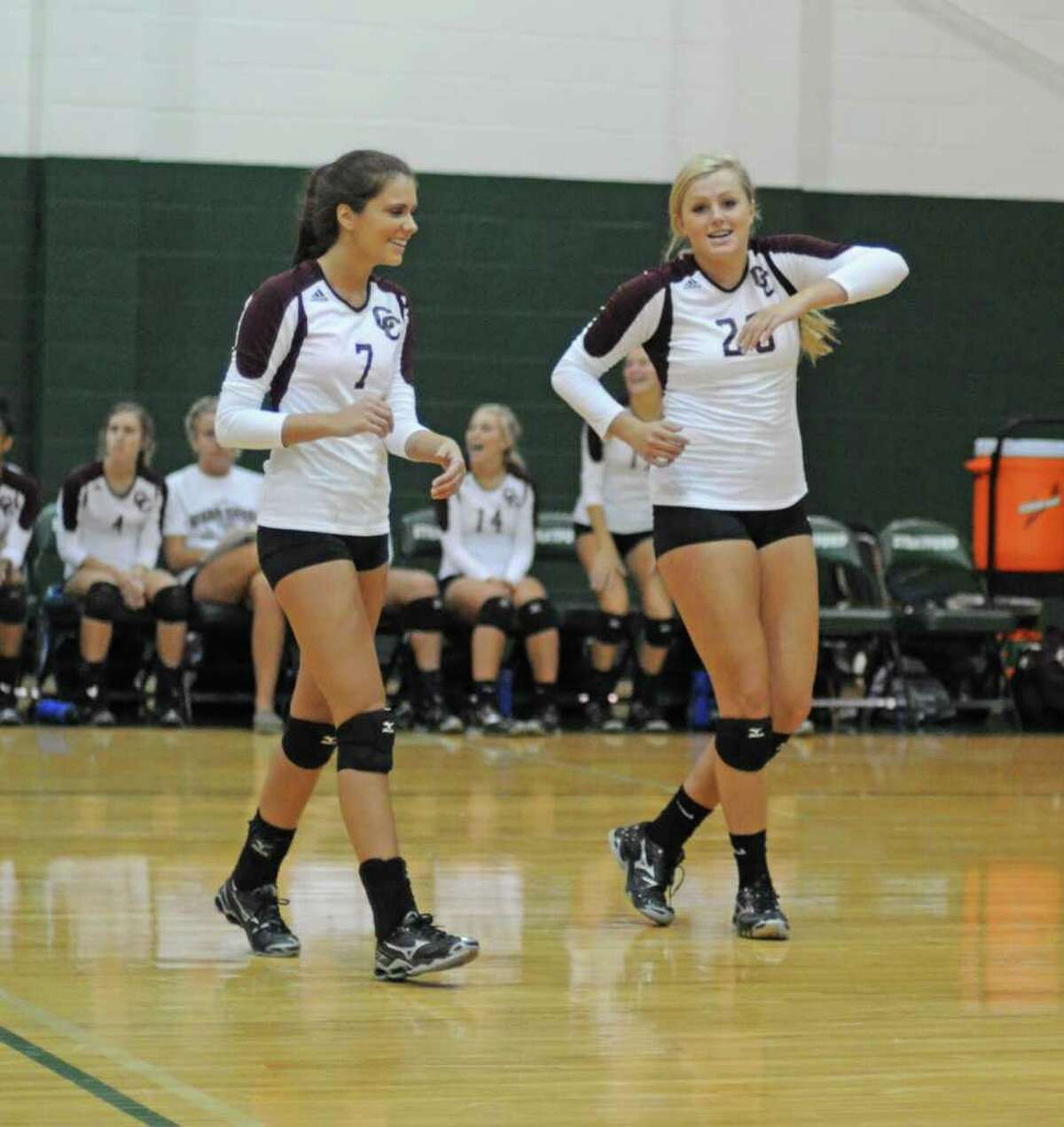 L. SCOTT HAINLINE: FOR THE CHRONICLE IN CHARGE: Clear Creek setter Courtney Richardson, left, and outside hitter Ashley Smith, No. 20, will be counted on next season to lead the Lady Wildcats through a district run.