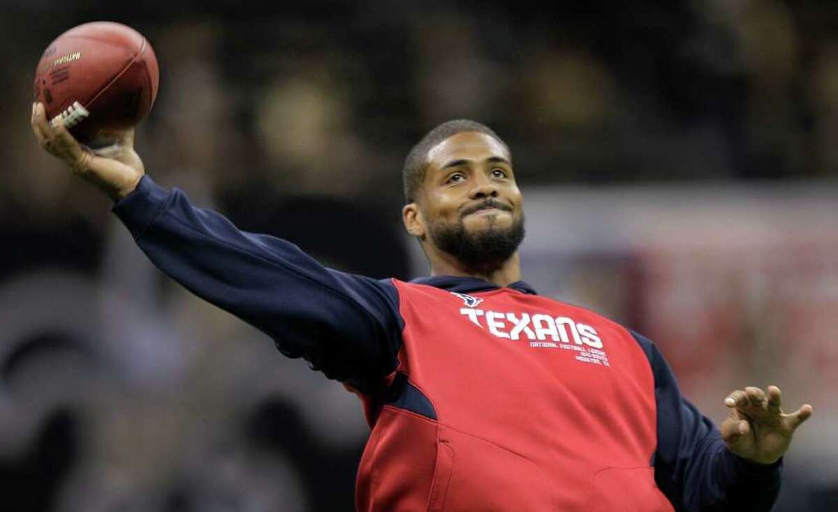 Houston Texans running back Arian Foster throws a ball before an NFL football game against the New Orleans Saints at the Louisiana Superdome Sunday, Sept. 25, 2011, New Orleans. Foster was ruled out before the start of the game.
