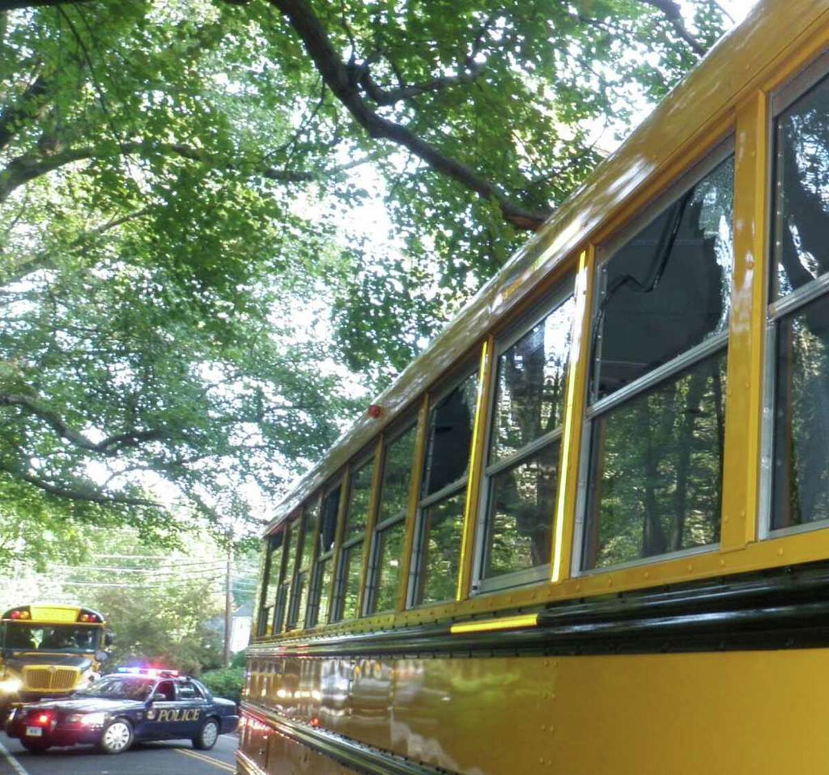 Three windows on this school bus were shattered Monday morning when it struck a low-hanging tree branch on Lyons Plains Road in Westport. Eight Weston students suffered minor injuries from the flying glass, but no one was hospitalized.