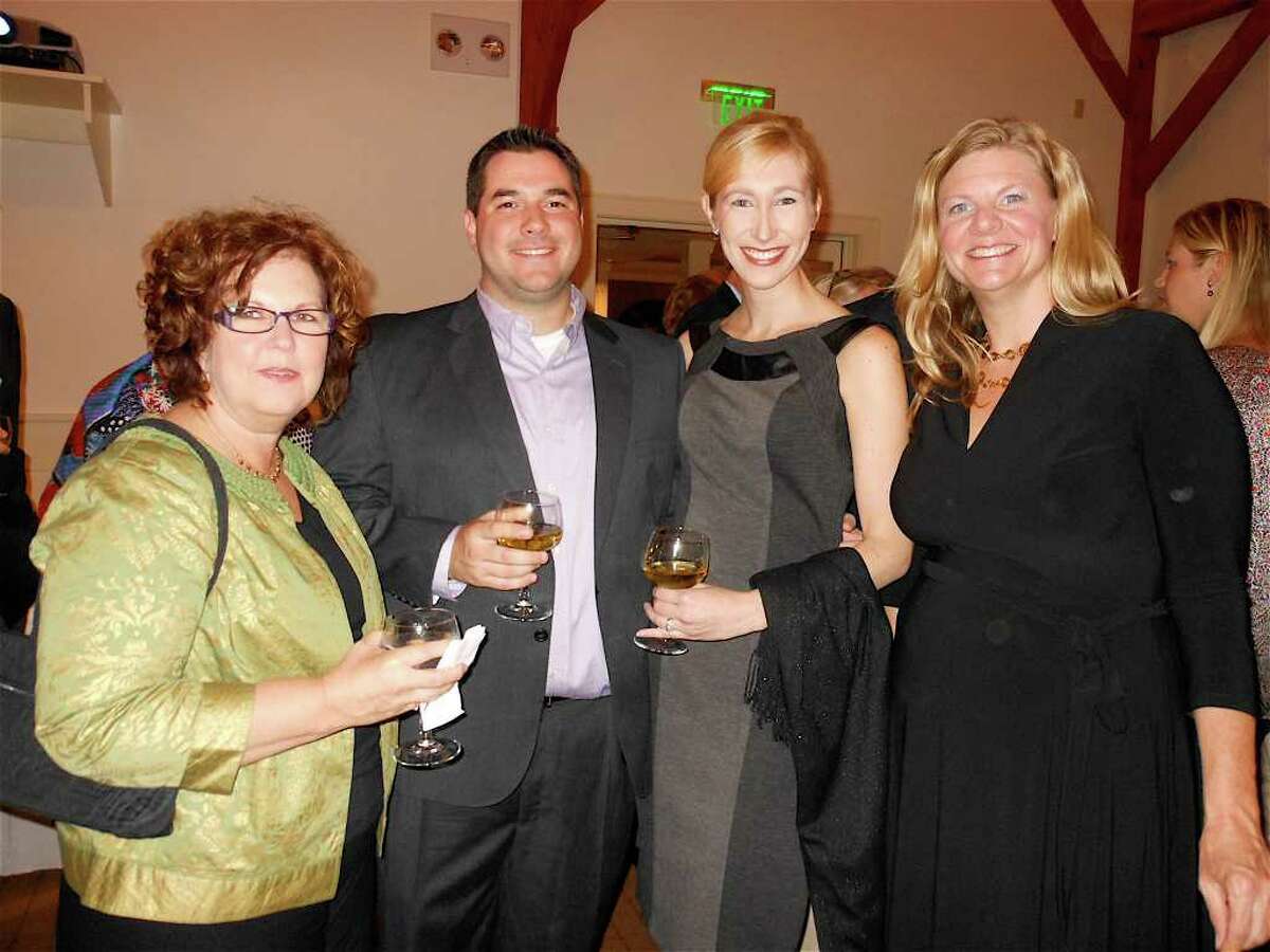 Ryan Odinak, executive director of Cultural Alliance of Fairfield County, left, with Matt and Jennifer Huisking, and CAFC's Laura Roberts on Saturday at the Fairfield Museum and History Center.