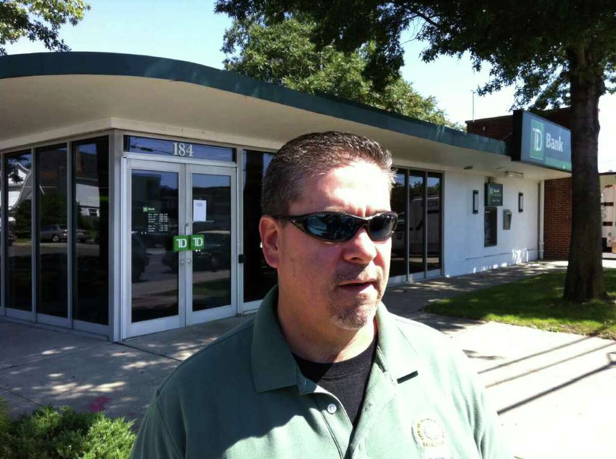Norwalk Detective Bureau Lt. Timothy Murphy discusses the robbery of the TD Bank branch at 184 Main St. Friday morning.