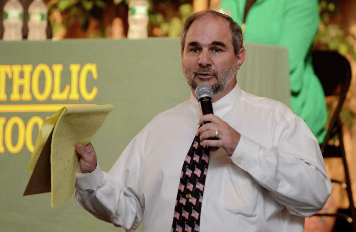 Principal Tony Pavia speaks at an assembly on Thursday, September 29, 2011 at Trinity Catholic High School in Stamford, CT where students and staff heard from people directly affected by the September 11 terrorist attacks.
