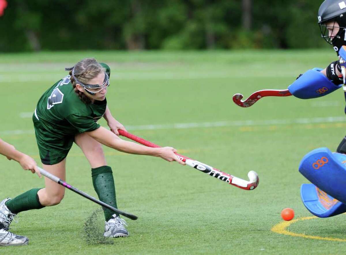 Maggie Annecchino, # 24 of Convent of the Sacred Heart scores on Westover goalie Rose Bradley during the first half of high school field hockey game between Convent of the Sacred Heart and Westover at Convent of the Sacred Heat, Saturday afternoon, Oct. 1, 2011.