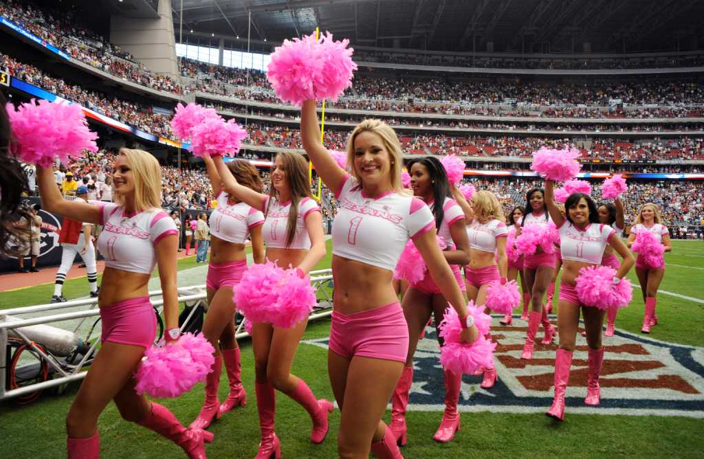 Miami Dolphins Cheerleader performs with her pom poms on the field News  Photo - Getty Images