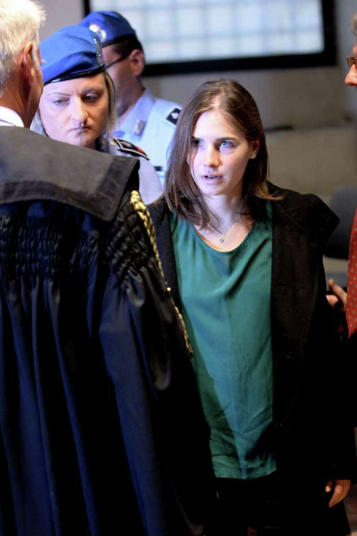 Amanda Knox arrives at Perugia's Court of Appeal the day of the verdict in her and Raffaele Sollecito's appeal of their murder convictions in Perugia, Italy.