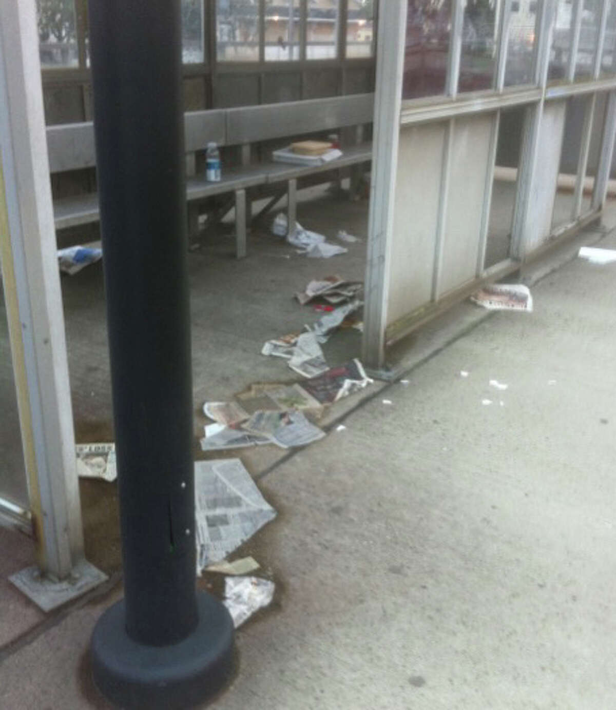 Litter is strewn around the passenger shelter on the eastbound platform of the Fairfield Railroad Station on Monday night.
