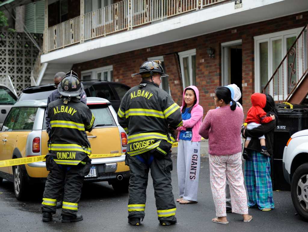 SUV crashes into apartment