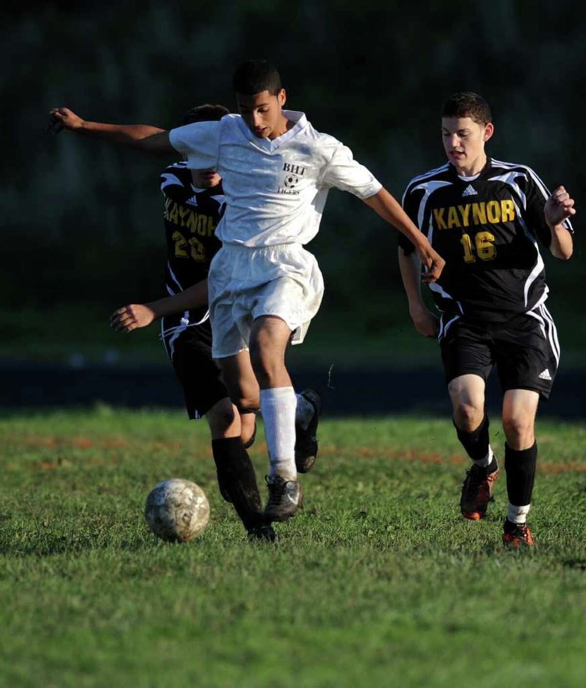 Bullard-Havens' Ronald Champlin controls the ball as Kaynor Tech's Cullen McCormack, left, and Justin Ramone defend during their soccer match Wednesday, Oct. 5, 2011 at the Bullard Havens campus in Bridgeport, Conn.