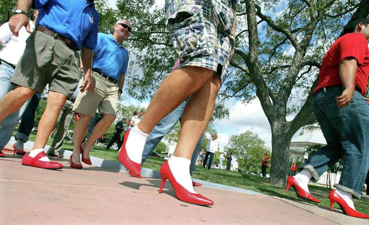 Men don heels for 'Walk a Mile in Her Shoes'