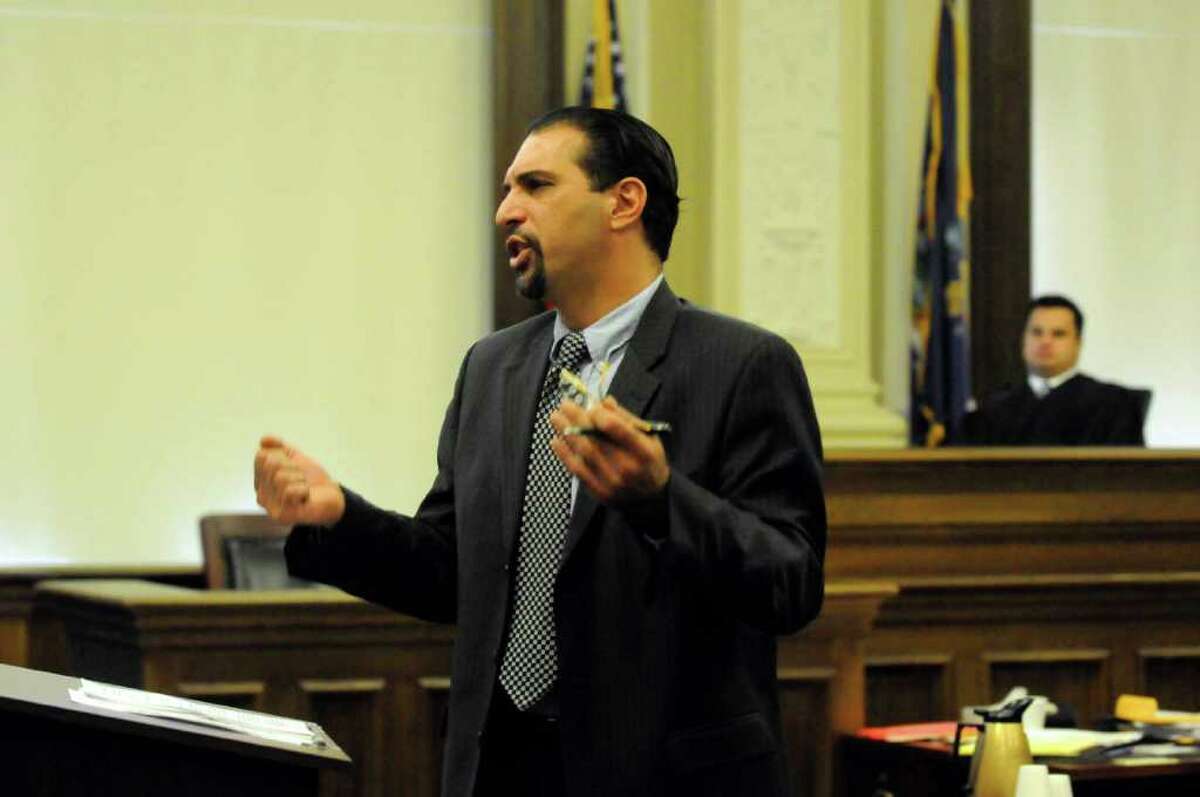 Defense attorney Gregory Cholakis makes his closing argument during Joseph McElheny's murder trial at the Rensselaer County Courthouse in Troy, N.Y. Thursday Oct. 6, 2011.The Hoosick Falls man is accused of killing his 4-month-old daughter.( Michael P. Farrell/Times Union)