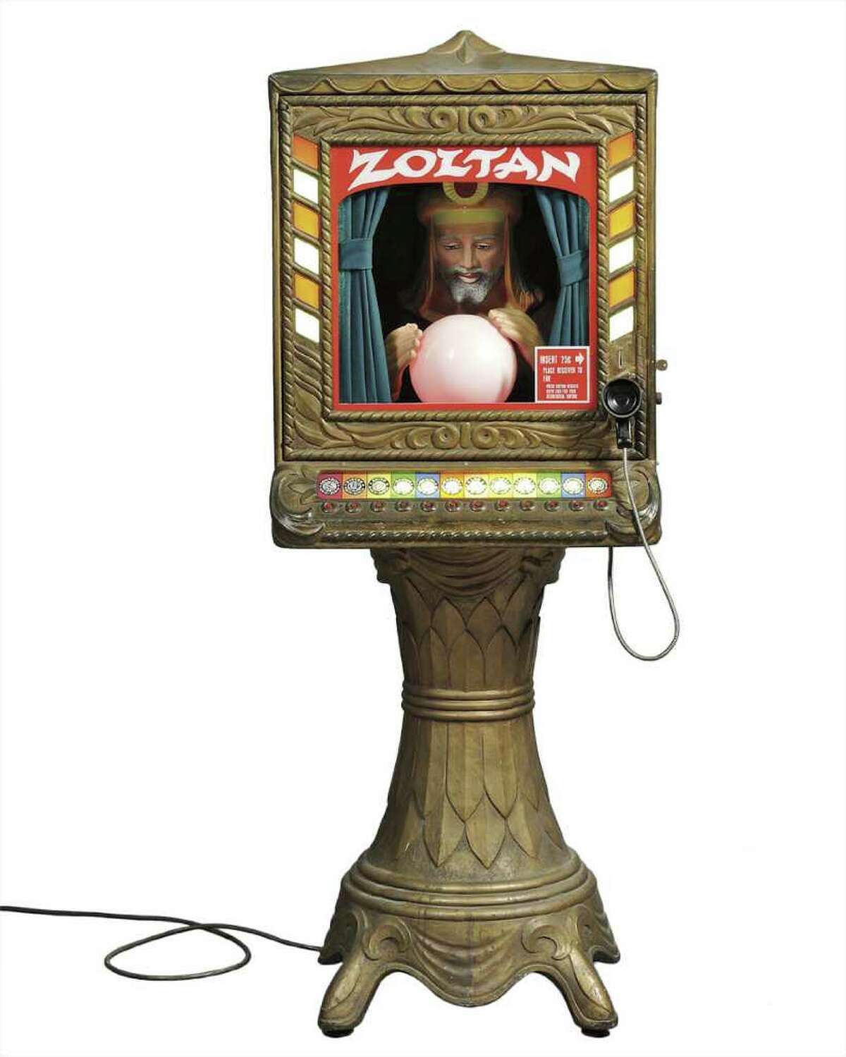 This is Zoltan, the coin-operated fortune teller made of fiberglass by Prophetron, Inc., in the early 1970s. The fortune was spoken by a voice thatís heard through an earpiece. Skinner, Inc., of Marlborough, Mass., auctioned it for $3,500. (Photo courtesy of Skinner, Inc.)