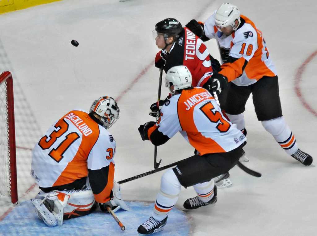 Newly acquired goaltender Jason Bacashihua skates before a game