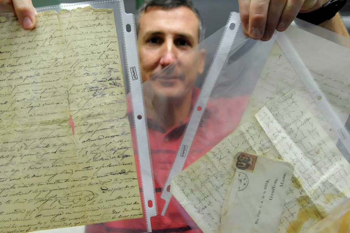 Jim Gandy, assistant librarian at the New York State Military Museum and Veterans Research Center, holds letters written by Carlos Alvarez de la Mesa on Thursday, Oct. 6, 2011 in Saratoga Springs. The museum has about 200 Civil War letters and documents pertaining to his service. Carlos Alvarez de la Mesa was a Spainaird who came to the U.S. to fight in the Civil War. (Paul Buckowski / Times Union)