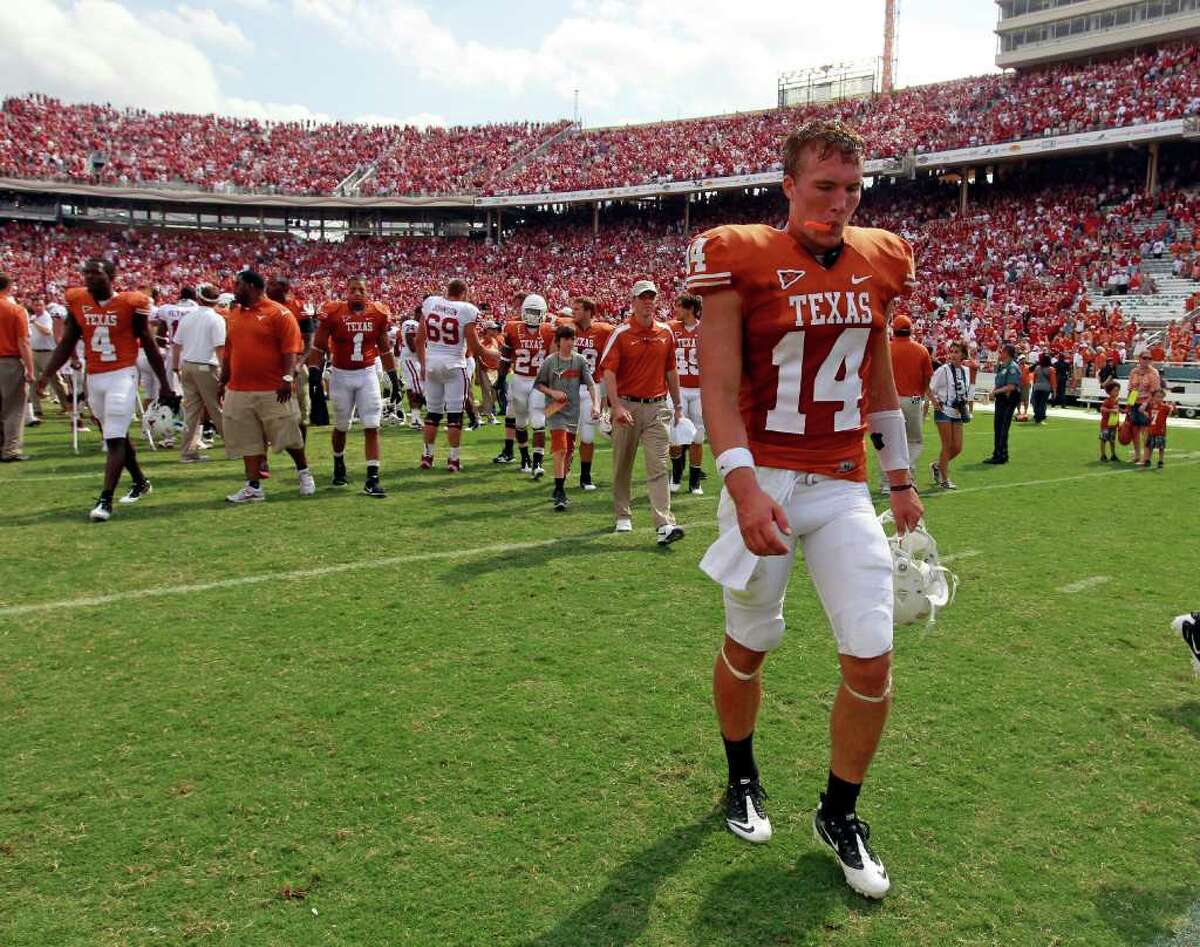 Texas Longhorns quarterback David Ash walks off the field at the end of the game. The Oklahoma Sooners defeated the Texas Longhorns, 55-17, at the Cotton Bowl in Dallas, Texas, Saturday October 8, 2011. (Gregg Ellman/Fort Worth Star-Telegram/MCT)