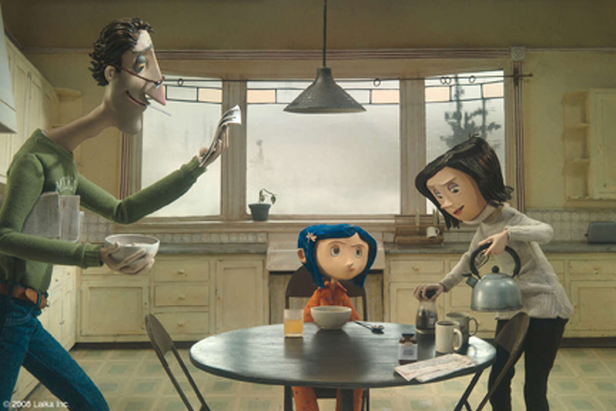 John Hodgman as the voice of Father, Dakota Fanning as the voice of Coraline and Teri Hatcher as the voice of Mother in "Coraline."