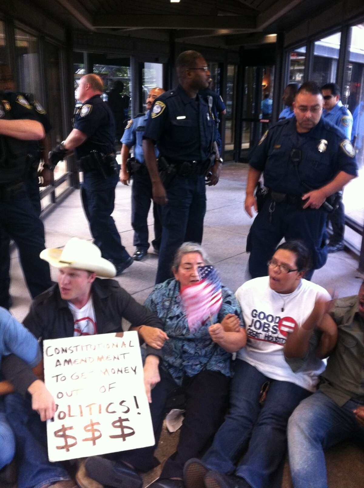 Protesters gather at the Leland building in Houston. Cody Duty/Chronicle