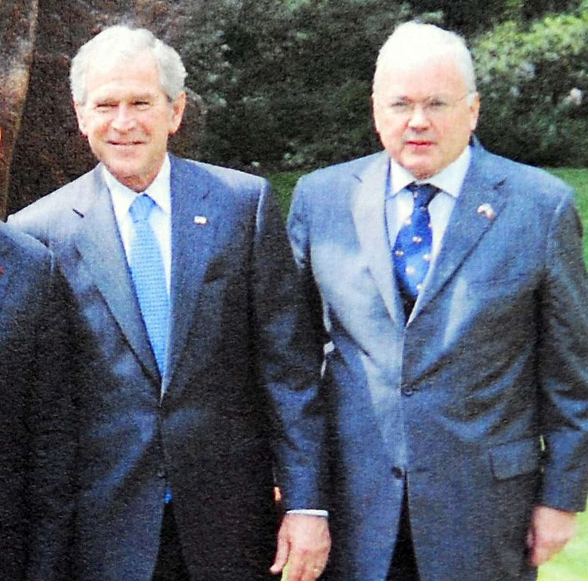 U.S. President George W. Bush, center and then U.S. Ambassador to France, Craig Stapleton in 2009. Stapleton formerly co-owned the Texas Rangers baseball team with George W. Bush but July 2009, he became a co-owner of the St. Louis Cardinals. The World Series, featuring the St. Louis Cardinals versus the Texas Rangers starts Wednesday Oct. 19, 2011 in St. Louis.