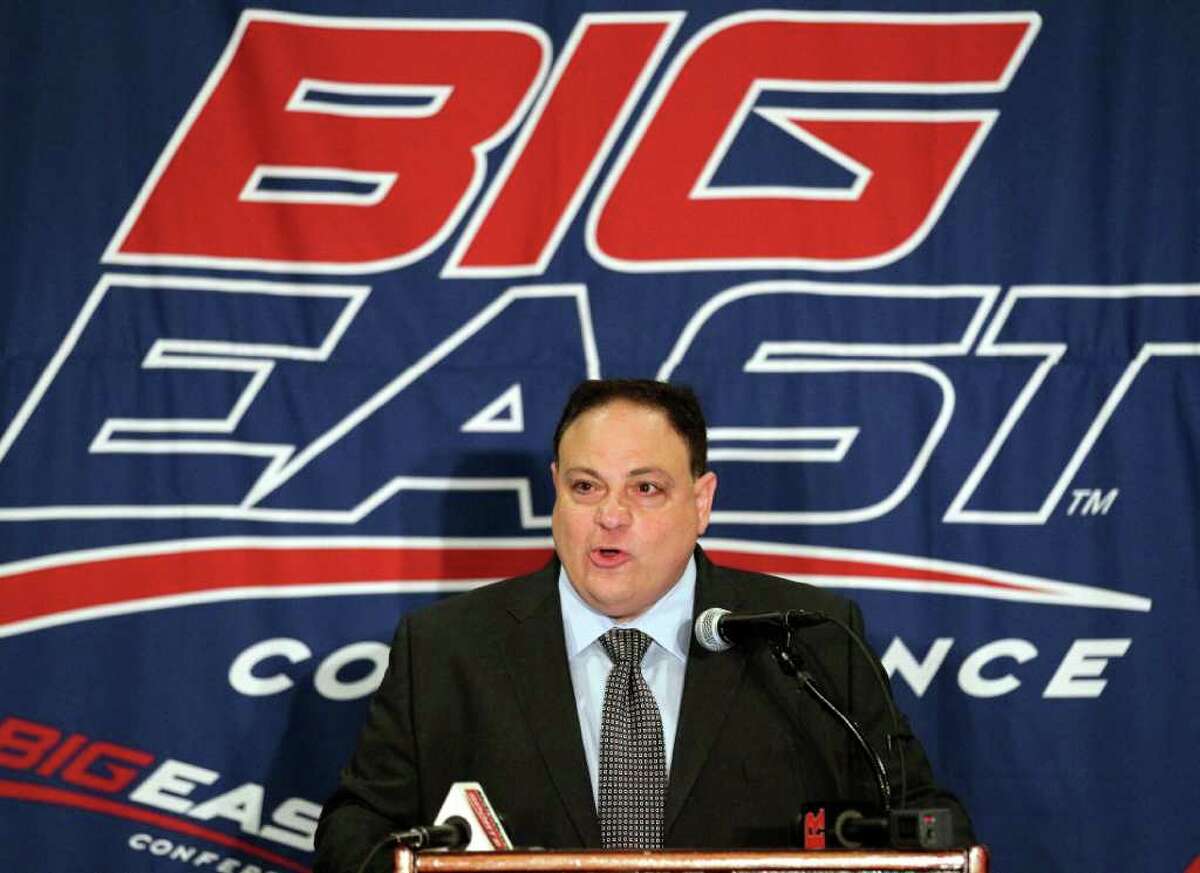 FILE - This Aug. 2, 2011 file photo shows Big East commissioner John Marinatto speaking to reporters during Big East football media day, in Newport, R.I. The Big East presidents voted Monday night, Oct. 17, 2011, to double the exit fee for football members to $10 million, a person with knowledge of the decision told The Associated Press. The person spoke on condition of anonymity because the conference did not plan to make any announcements. Commissioner Marinatto has a teleconference scheduled with reporters for Tuesday. (AP Photo/Stew Milne, File)