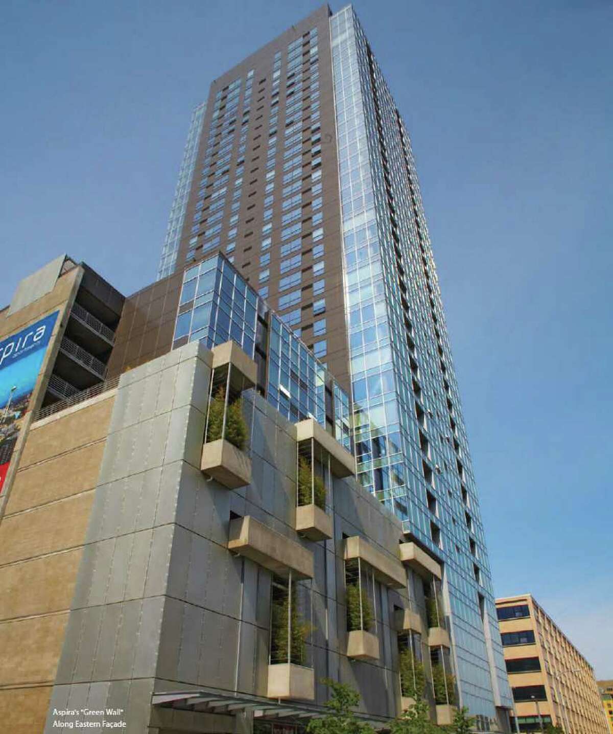 The developers of Aspira, a 37-story, 324-unit apartment building at 1823 Terry Ave., just put the tower up for sale. The tower, completed last year, aims to appeal to young professionals.