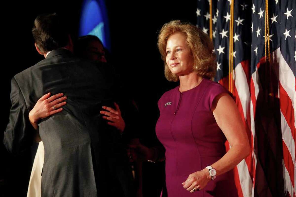Anita Perry stands by as her husband, Governor Rick Perry, embraces their daughter after he gave a speech officially declaring his run for President of the United States at the RedState Gathering in Charleston, SC on Saturday, August 13, 2011.
