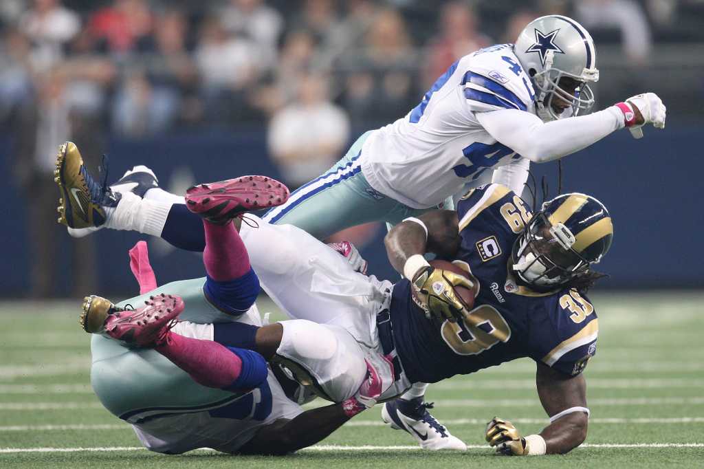 Murray rushes for record 253 yards as Cowboys top Rams 34-7