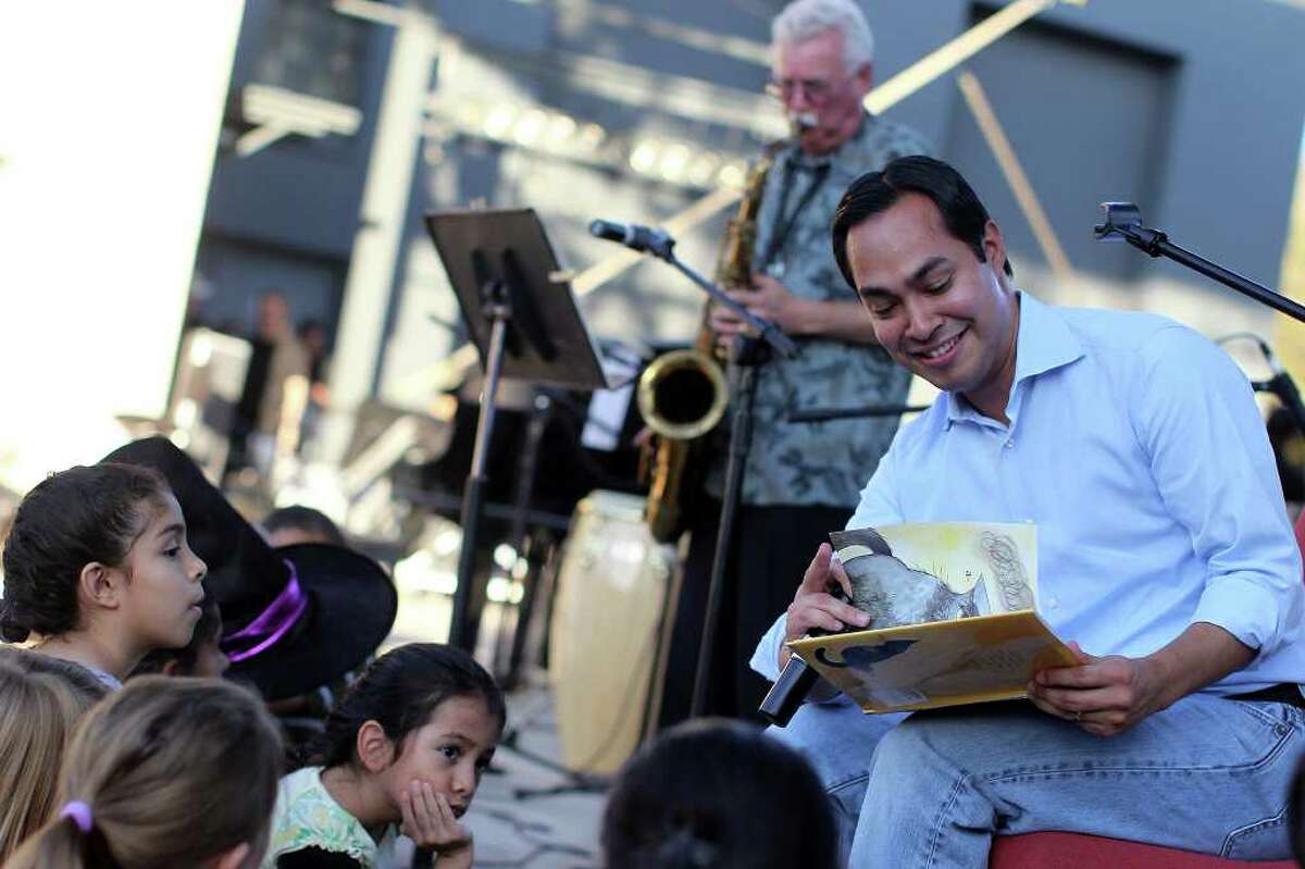 Mayor Julián Castro reads children's book "Charlie Parker Played Be-Bop" to the accompaniment of saxaphonist Jim Waller during "Jazz Family Showcase," the kick-off event of Trinity University radio station KRTU's Year of Jazz, a celebration of the station's 10 years of airing a jazz-driven format, Sunday, October 28, 2011.