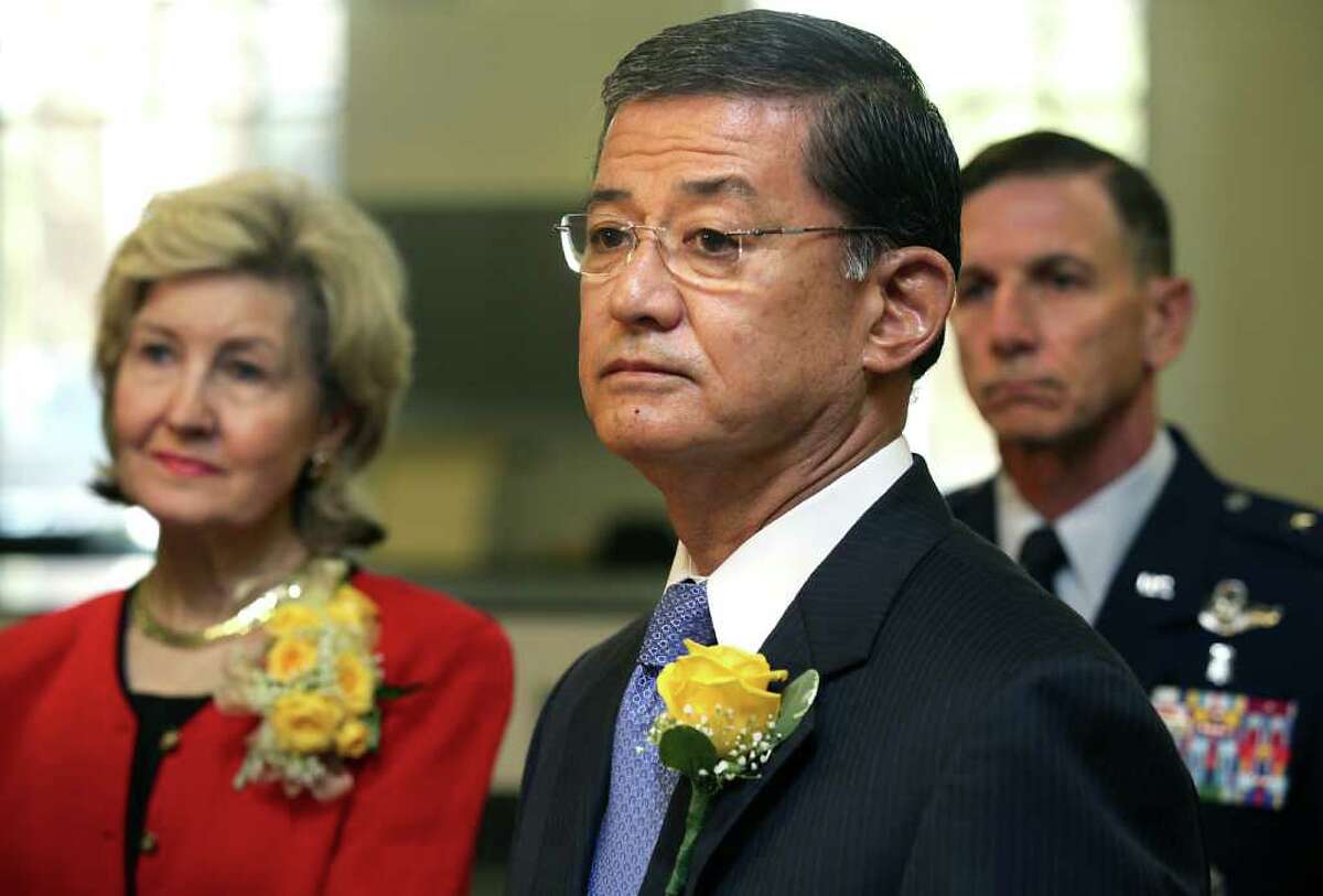 Secretary of Veterans Affairs Eric K. Shinseki, center, listens to a question during a press conference with Senator Kay Bailey Hutchison, left, and U.S. Air Force Major Gen. Byron C. Hepburn, during the dedication ceremony of the Polytrauma Rehabilitation Center which is in the South Texas Veterans Health Care System.