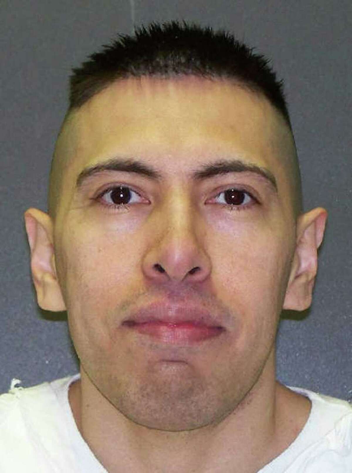 This photo provided Oct. 25, 2011, by the Texas Department of Criminal Justice shows Frank Garcia. Garcia is set for lethal injection Thursday, Oct. 27, 2011, for death of police Sgt. Hector Garza more than a decade ago during a domestic violence call. Garcia also killed his wife in the same shooting outburst.
