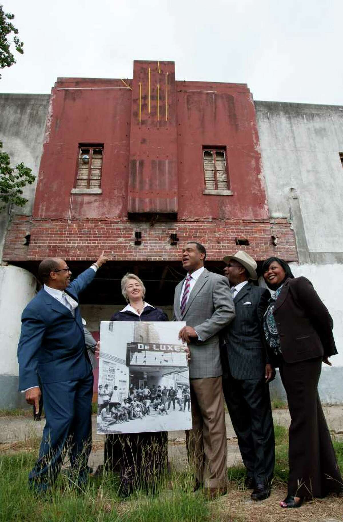 From left, TSU President Dr. John Rudley, Mayor Annise Parker, Councilman Jarvis Johnson, the Rev. Harvey Clemons Jr., and Fifth Ward Community Redevelopment Corp. President Kathy F. Payton gather Friday to announce their plan for the abandoned DeLuxe Theater.