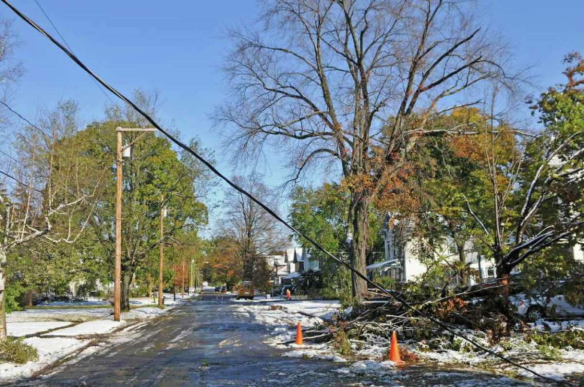A utility line and trees are down on Elm Street following a surprise fall snowstorm the previous night, on Sunday Oct. 30, 2011 in Saugerties, NY. (Philip Kamrass / Times Union )