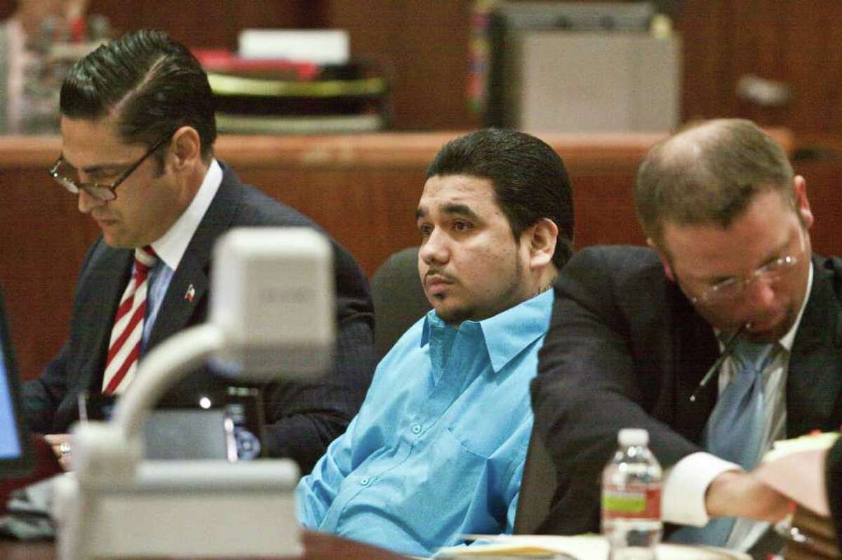ERIC KAYNE : FOR THE CHRONICLE TRIAL OPENS: Damian Flores, center, is on trial on attempted capital murder charges in the May 2010 shooting of Yvonne Stern, wife of Houston attorney Jeffrey Stern. It was the third failed attempt on the woman's life.