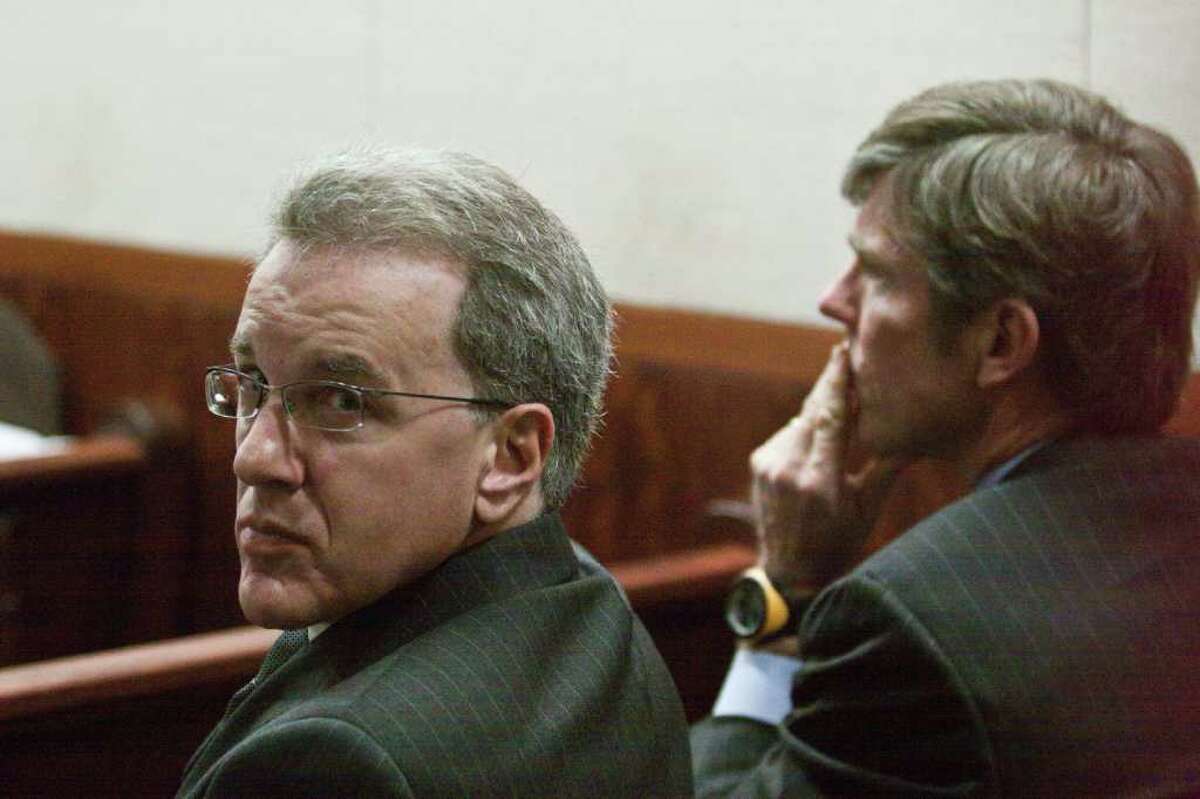 Jeffrey Stern, left, is present during the trial of Damian Ricardo Flores, 28, alleged to have been the last shooter on Yvonne Stern's life. Flores is accused of being the gunman who walked up to Stern and shot her in the abdomen outside an apartment at 4550 Braeswood. Oct. 27, 2011 in Houston. (Eric Kayne/For the Chronicle)