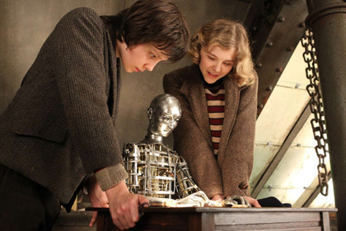 Asa Butterfield as Hugo Cabret and Chloe Grace Moretz as Isabelle in "Hugo."