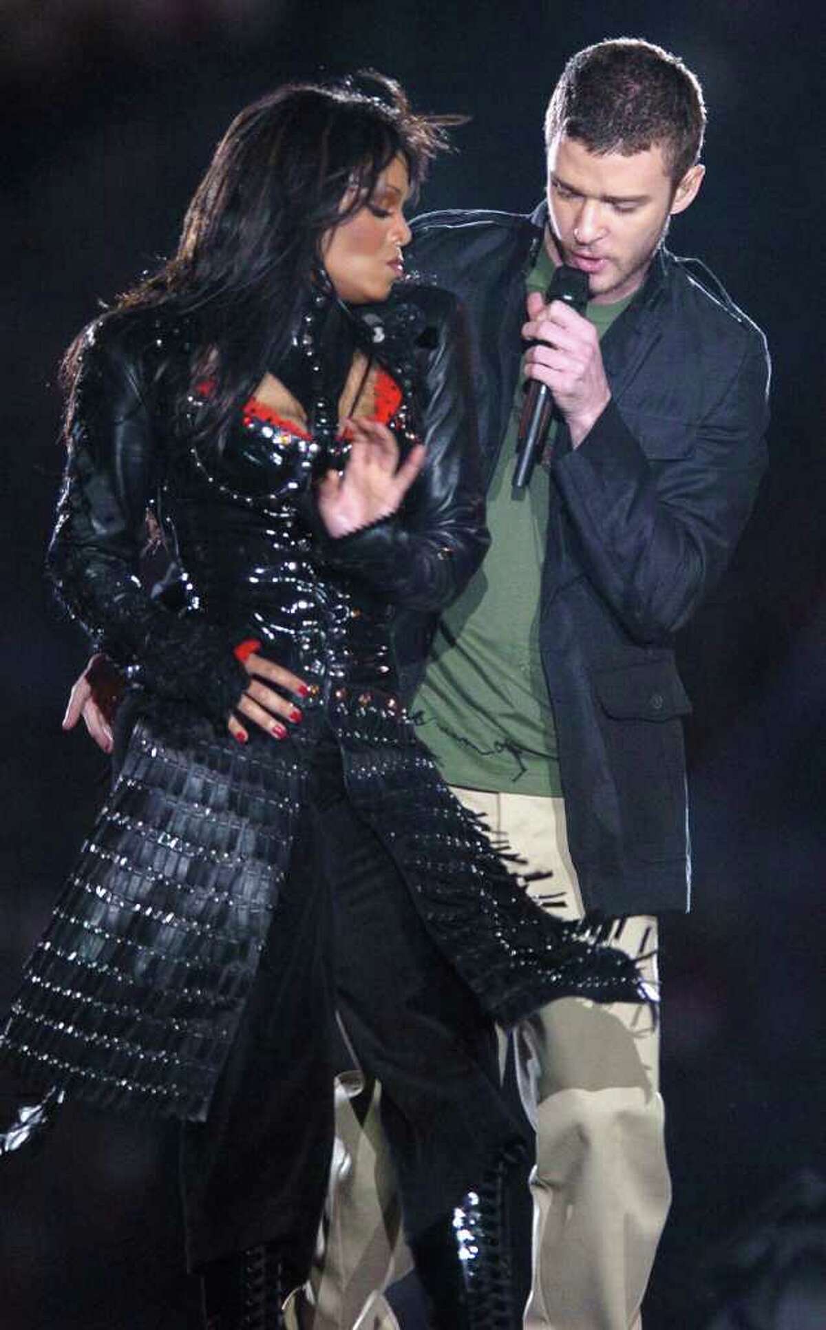 ASSOCIATED PRESS FILE PHOTO 2004 INCIDENT: Justin Timberlake and Janet Jackson are seen during their Super Bowl XXXVIII performance prior to a "wardrobe malfunction" during the halftime performance.