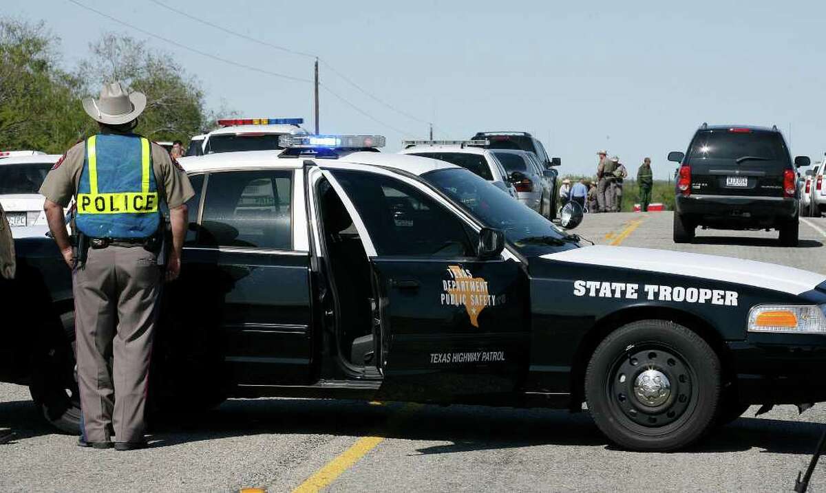 The Department of Public Safety block off FM 666 near Mathis, Texas as they and the U.S. Border Patrol investigate a shooting Thursday, Nov. 3, 2011. One person was shot and killed by a U.S. Border Patrol agent stationed in Corpus Christi during a traffic stop.