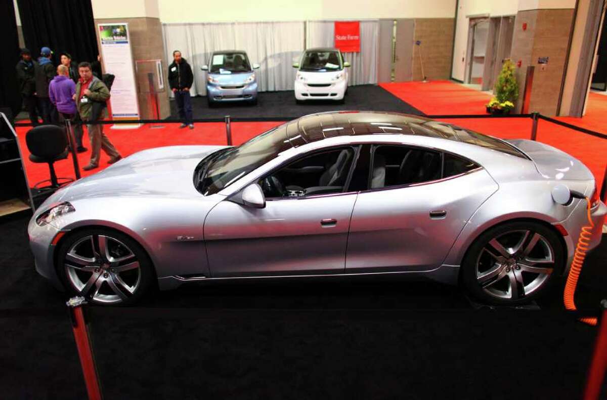 A 2012 Fisker Karma electric, exotic sports car is shown on Wednesday November 2, 2011, during the Seattle Auto Show at CenturyLink Field Events Center.