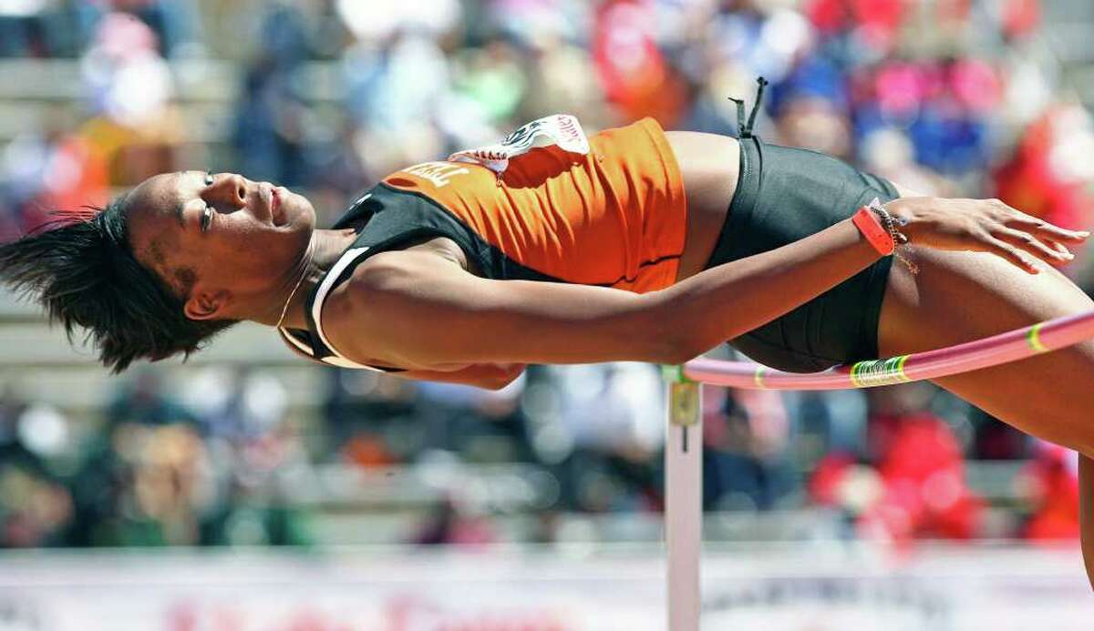 Destinee Hooker clears her final height to win the women's high jump at the Texas Relays Friday afternoon at Mike Myers Stadium in Austin. Tom Reel/Staff April 3, 2009.