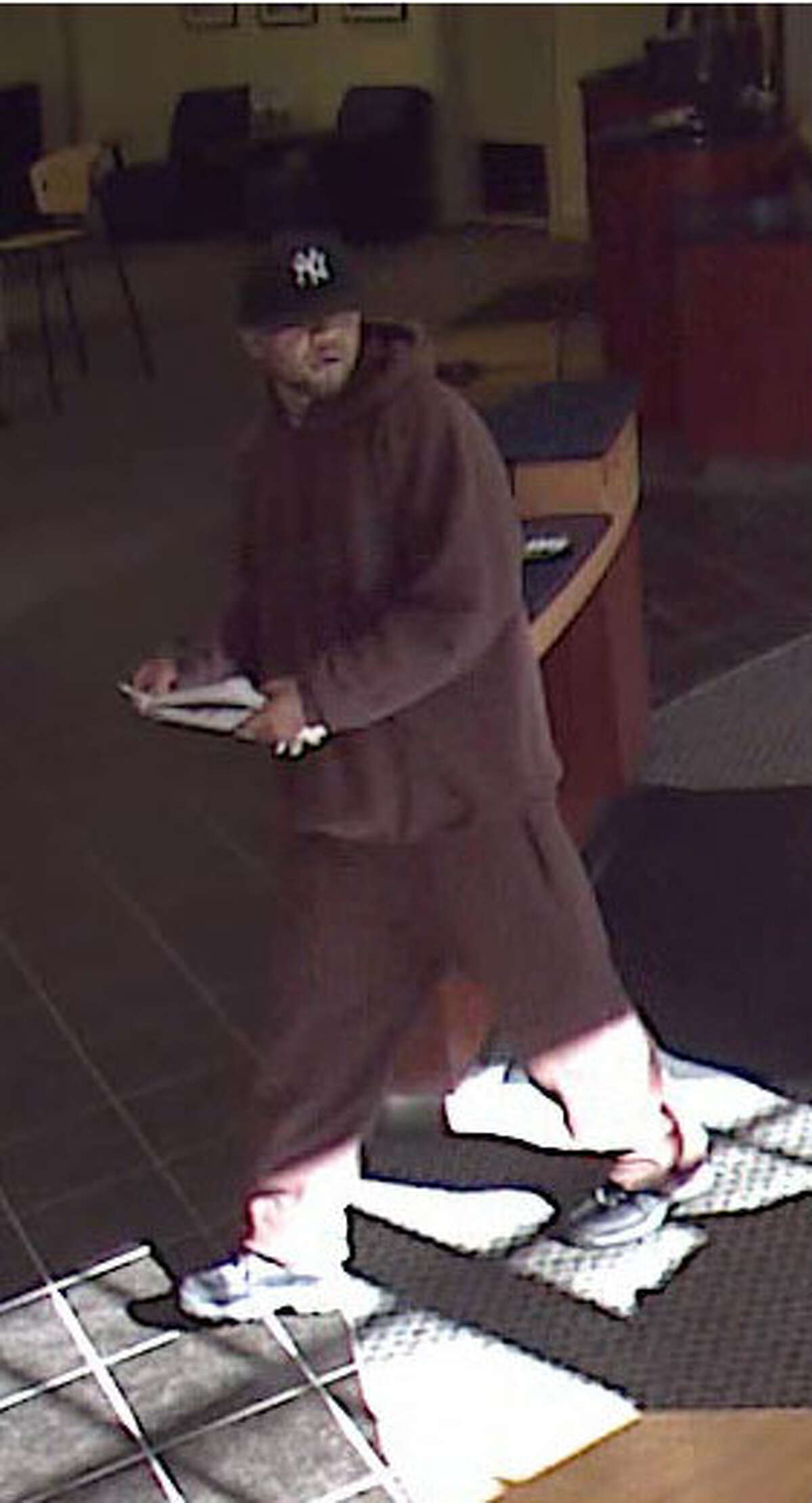 Greenwich Police are searching for this man, who is suspected of robbing the People's United Bank at the bottom of Greenwich Avenue on Saturday morning, Nov. 5, 2011.