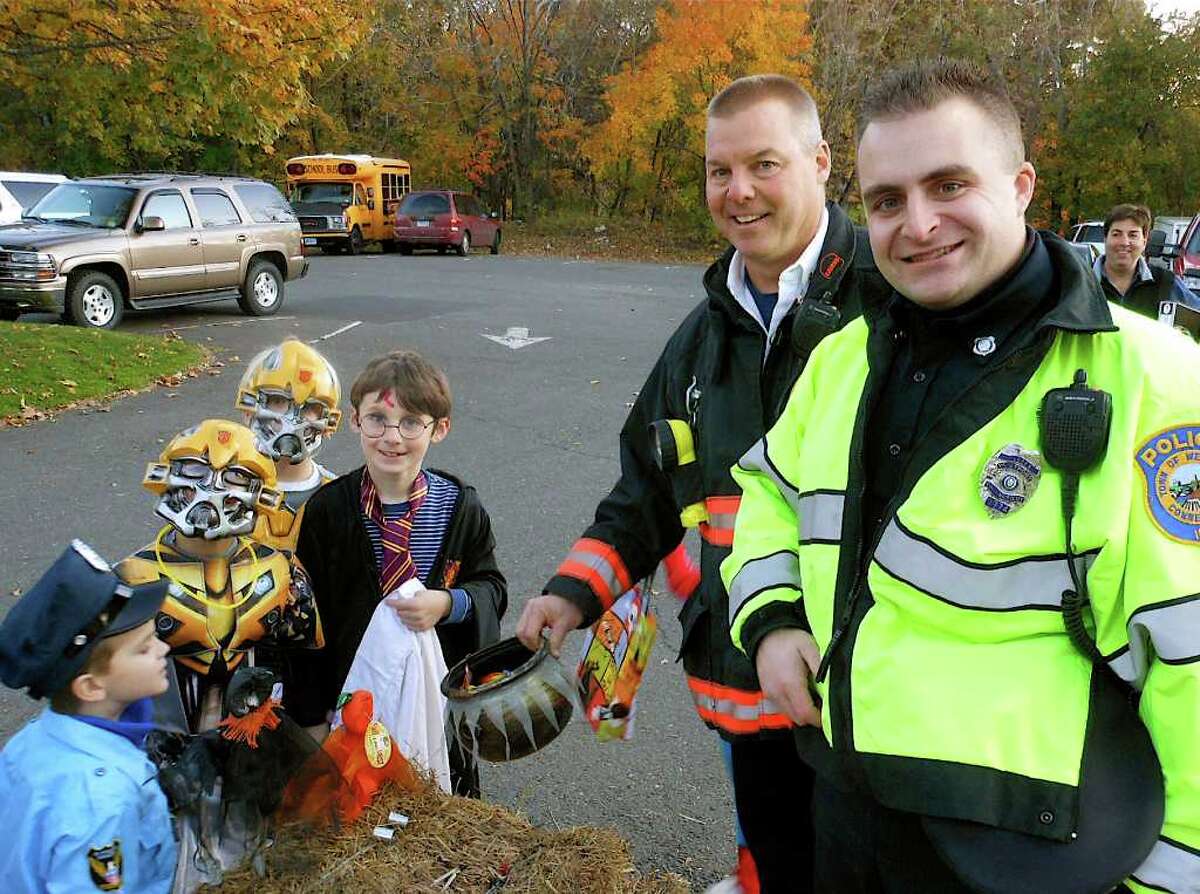Westport cops treat kids to postponed Halloween fun